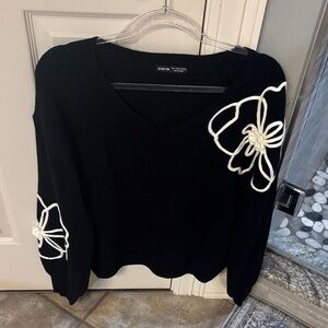 SHEIN Black Sweater with White Floral Design